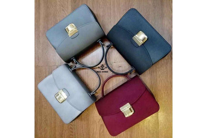 Túi xách nữ hàng hiệu giảm giá đẹp MiuMiu nhựa khóa Gài tại TPHCM